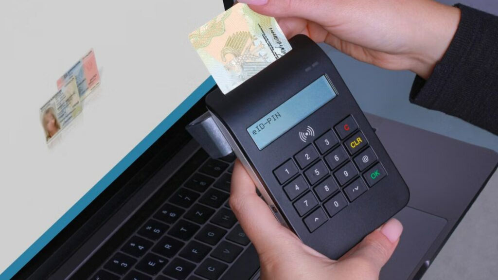 Documento di identità utilizzato con un dispositivo elettronico collegato a un computer